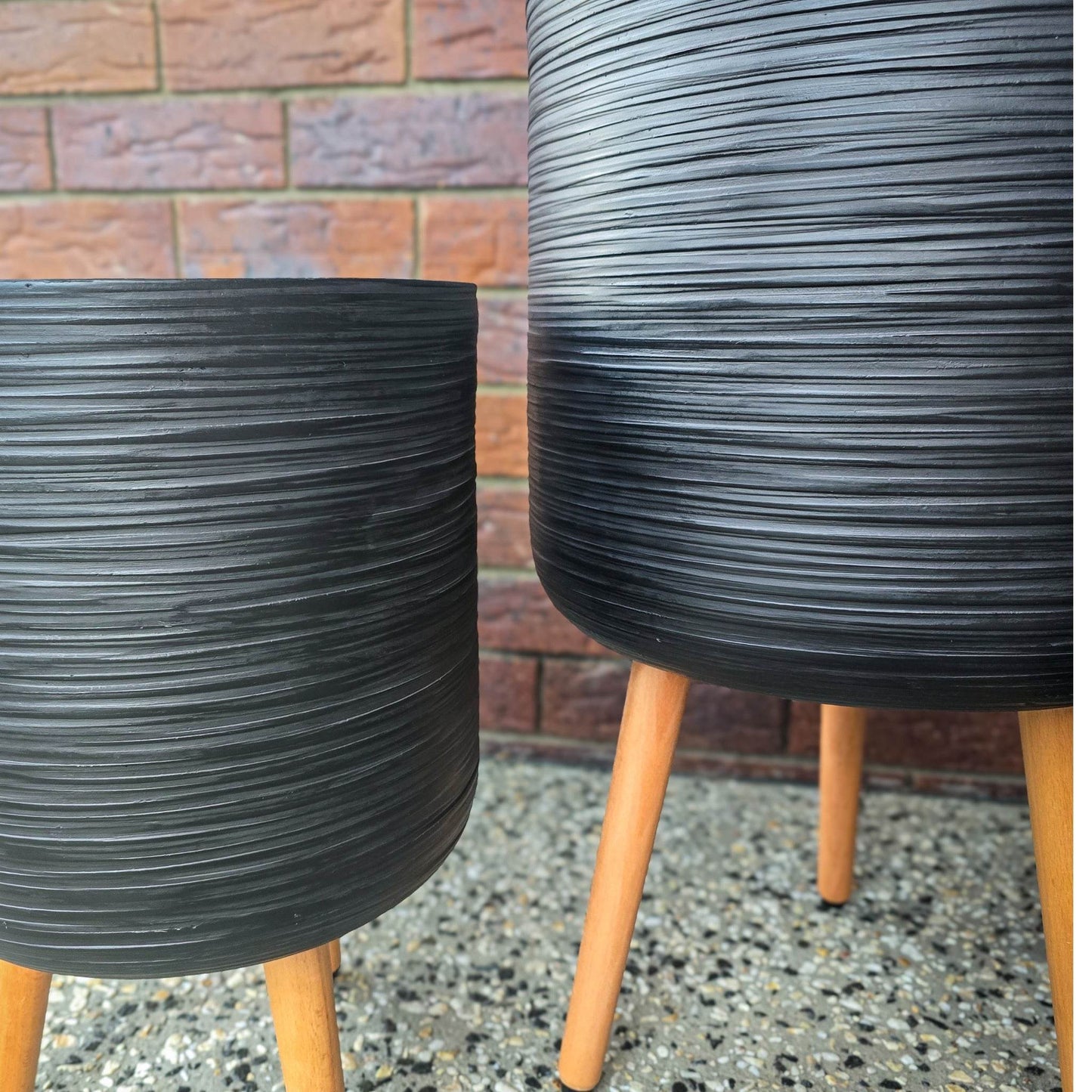 Tripod timber leg pot for modern interiors- sirroco tripods in black pot pattern 